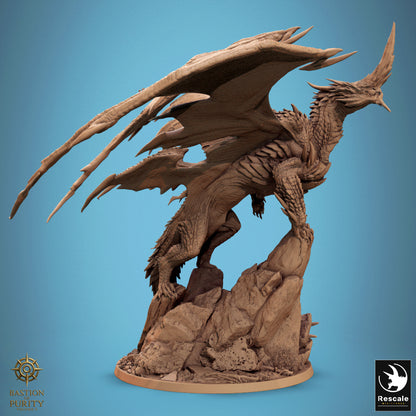 Blue Dragon miniature from Tattles Told 3D's 2024 redesign, detailed resin model for D&D tabletop RPG gaming.