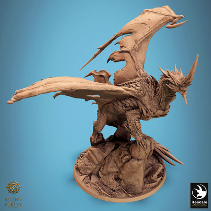 Blue Dragon miniature from Tattles Told 3D's 2024 redesign for D&D TTRPG, detailed blue dragon figure on a display base.