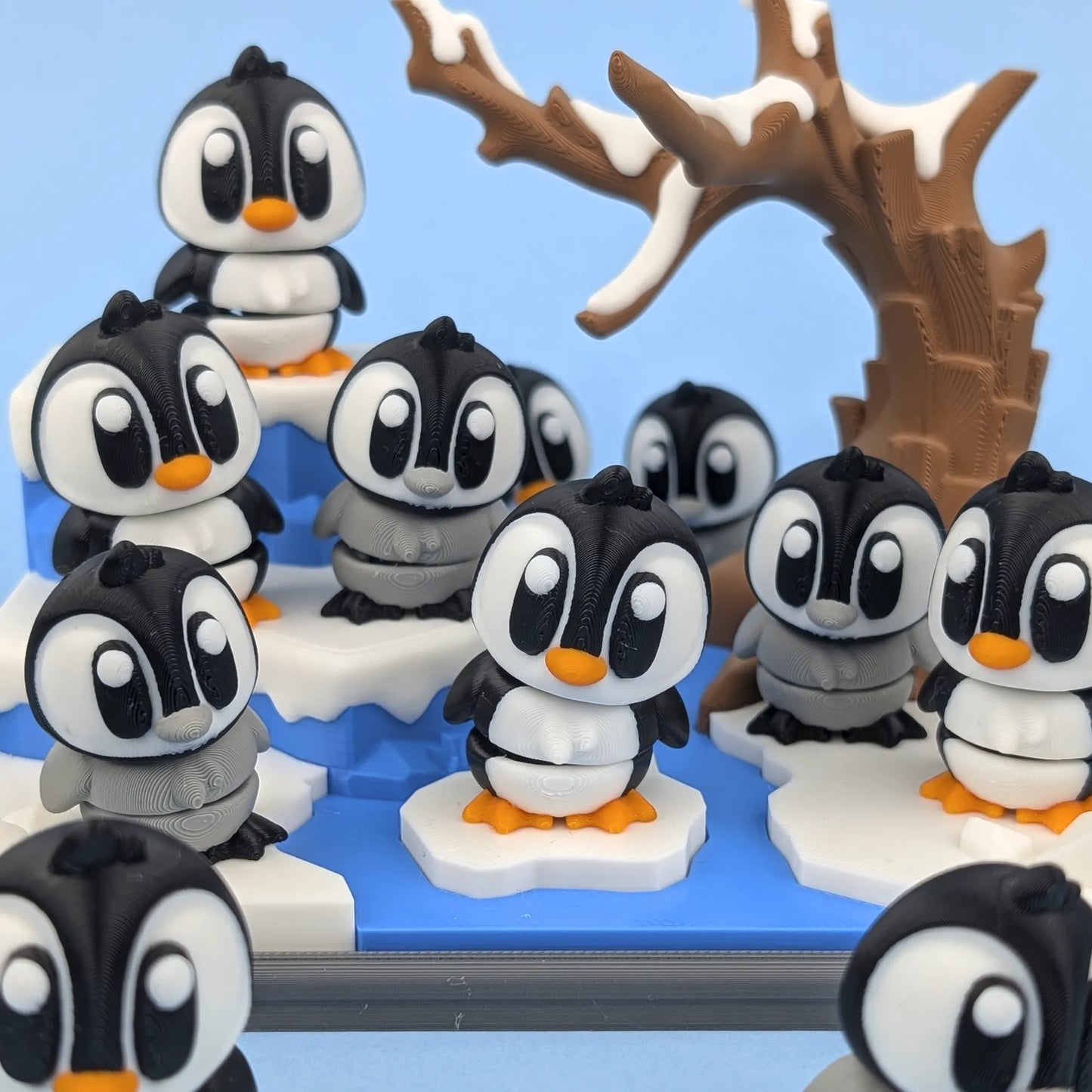 Miniature Flexi Penguin from Tattles Told 3D's Playset, featuring colorful flexible plastic design and playful details.