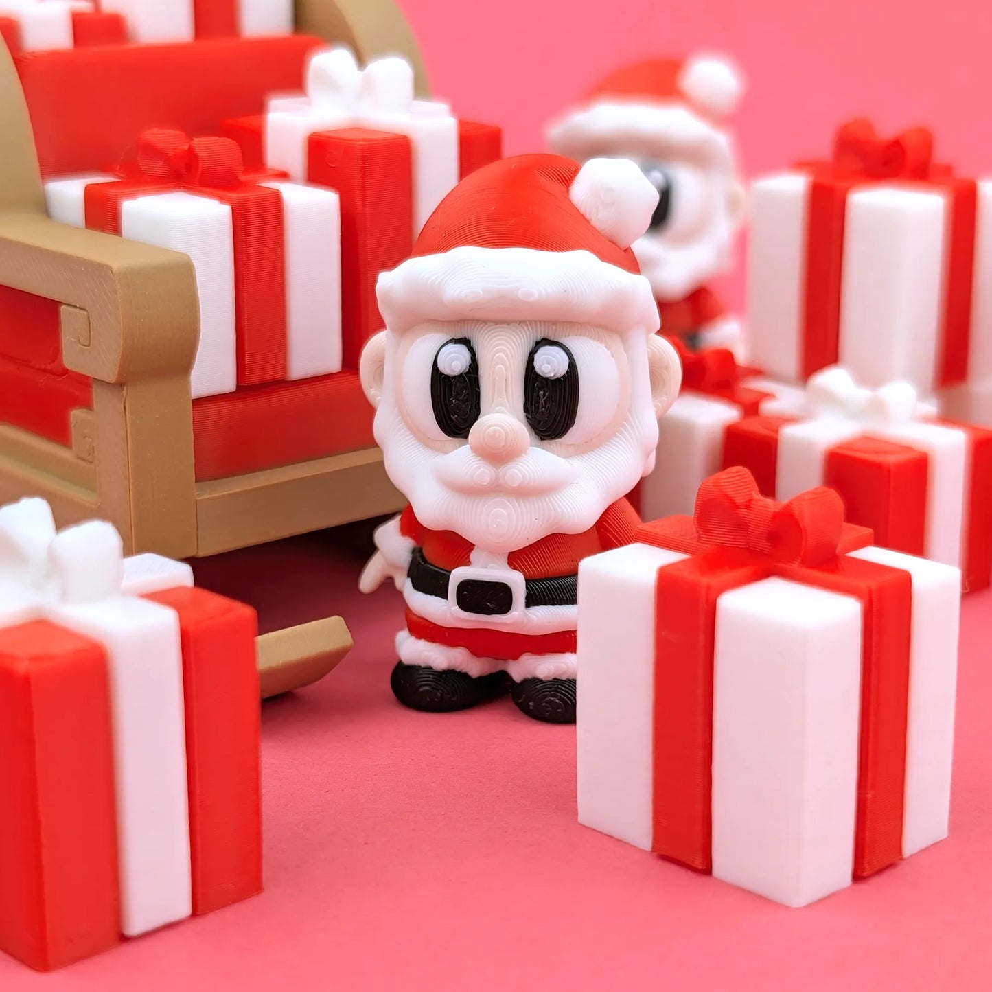 Miniature Flexi Santa with sleigh figurine by Tattles Told 3D, featuring a flexible Santa and festive sleigh scene.