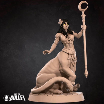 Exxotic Lamia resin miniature from Tattles Told 3D, detailed tabletop gaming figure in pinup style, shown from a side angle.