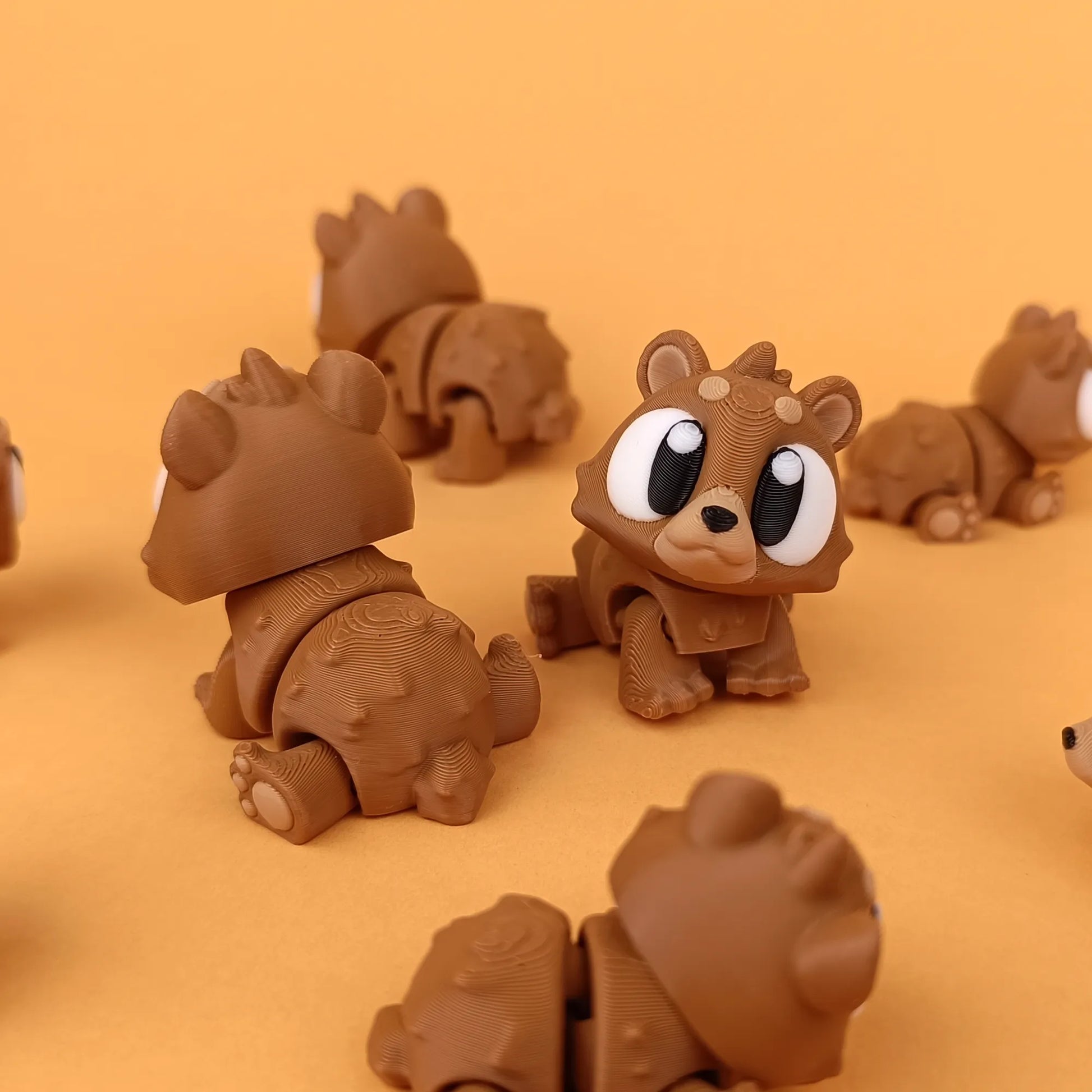 Miniature Flexi Mini Bear by Tattles Told 3D featuring a cute, flexible bear figure on a neutral background.