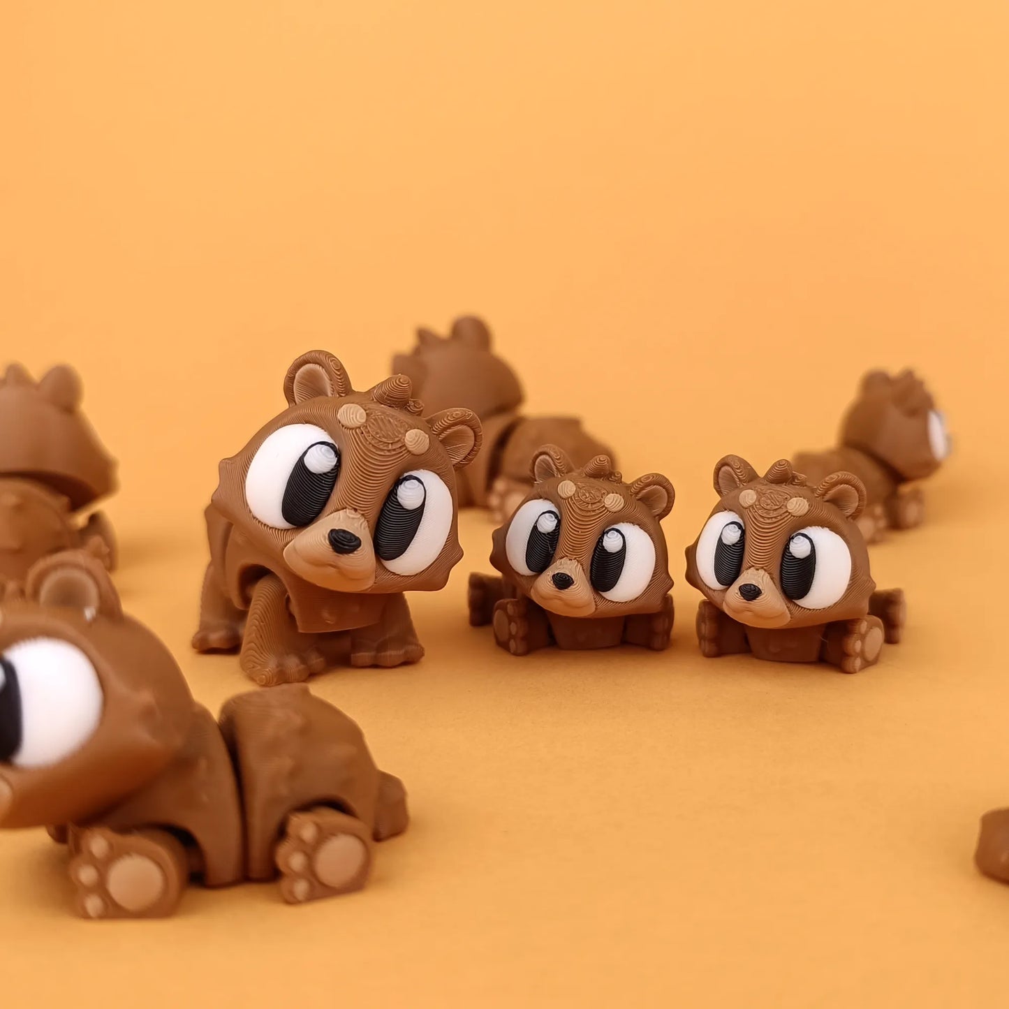 Miniature Flexi Mini Bear by Tattles Told 3D, featuring a cute, flexible bear figure with detailed design.