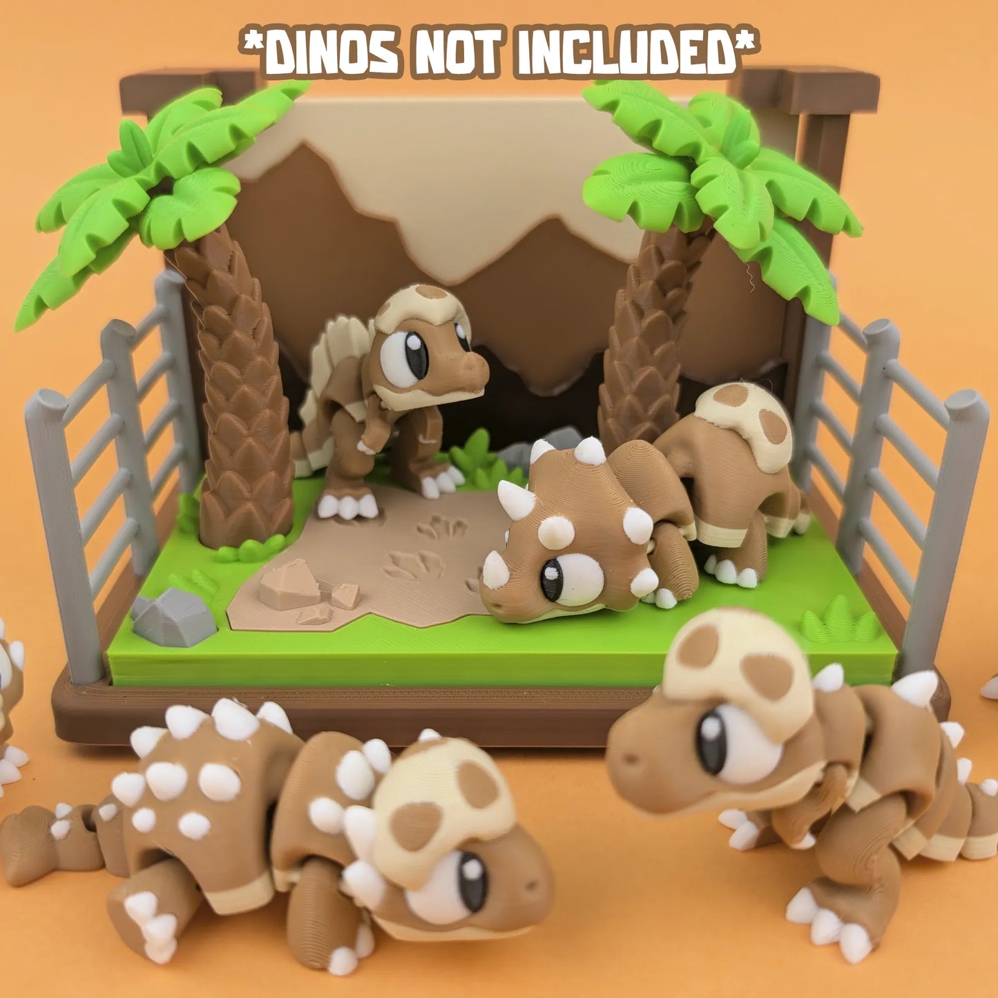 Miniature Jurassic World Playset by Tattles Told 3D featuring tiny dinosaur figures and jungle accessories.