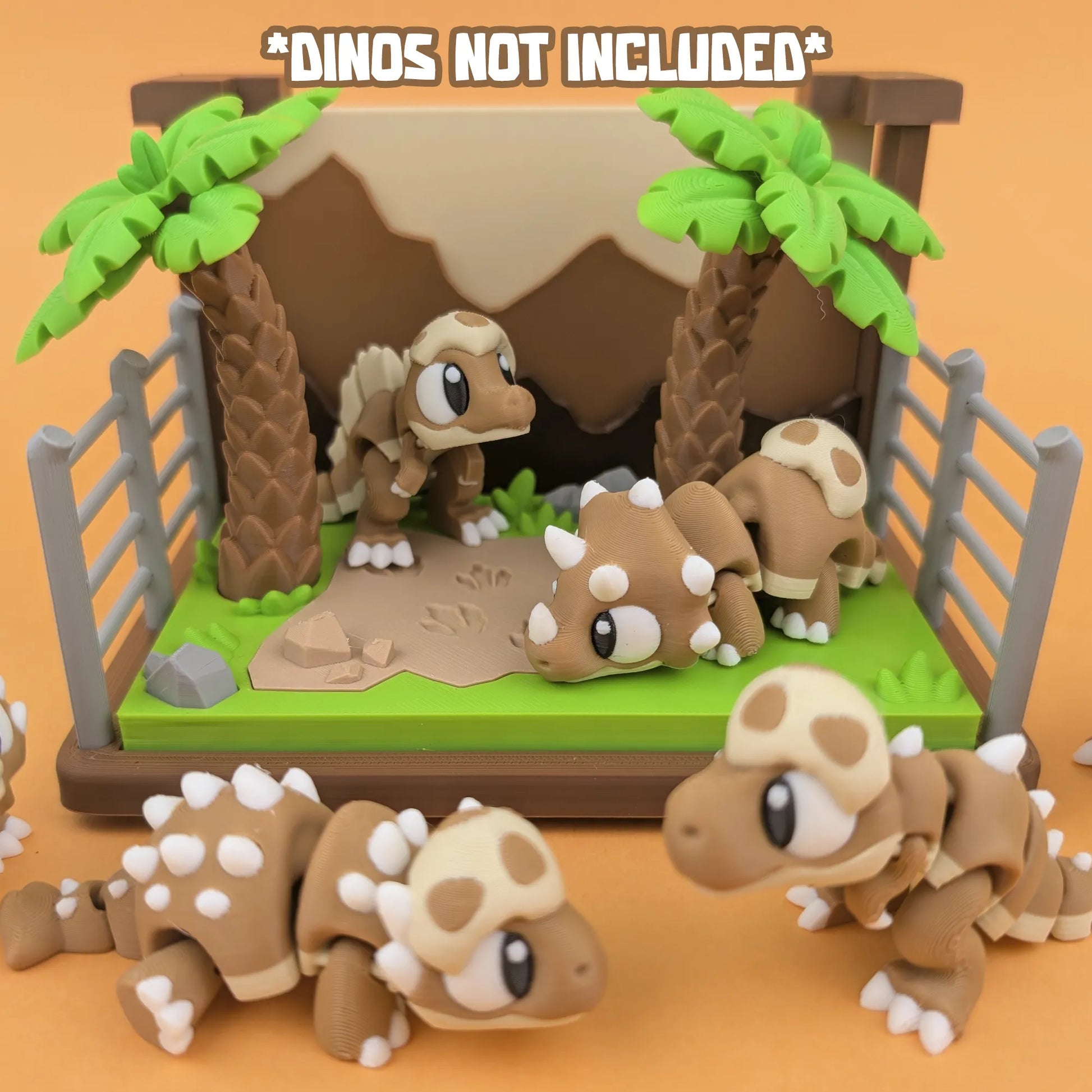 Miniature Jurassic World Playset by Tattles Told 3D featuring tiny dinosaur figures and jungle accessories.