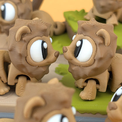 Miniature Flexi Lion from the Savannah Playset by Tattles Told 3D, featuring detailed lion figure on a neutral background.