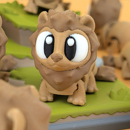 Miniature Flexi Lion and Savannah Playset by Tattles Told 3D featuring detailed lion and savannah animal figures.