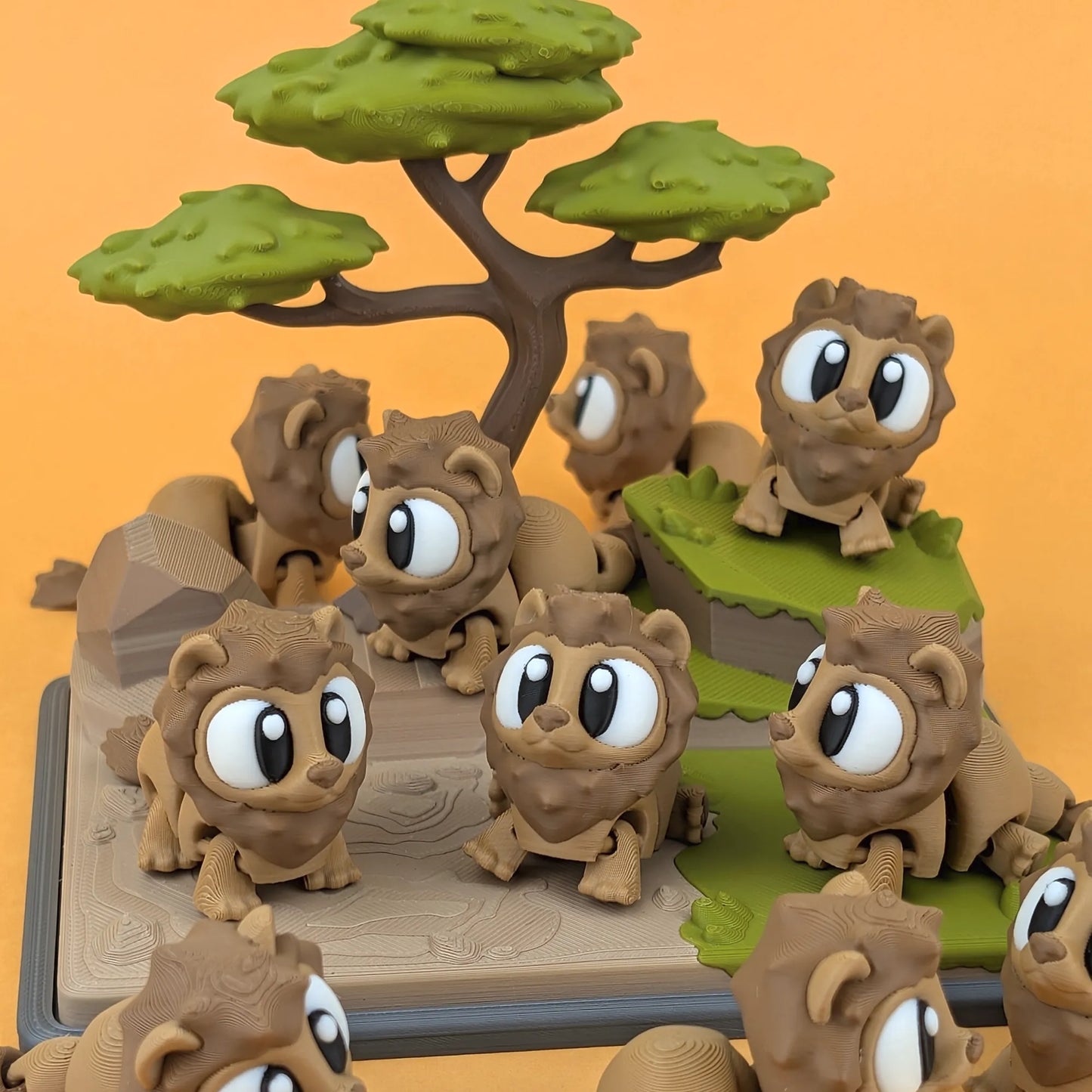 Miniature Flexi Lion and Savannah Playset by Tattles Told 3D featuring colorful lion and savannah animals in vibrant detail.