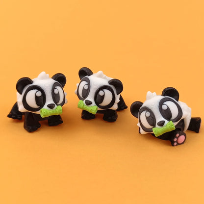 Miniature Flexi Panda toy by Tattles Told 3D featuring a cute panda design on a transparent background.