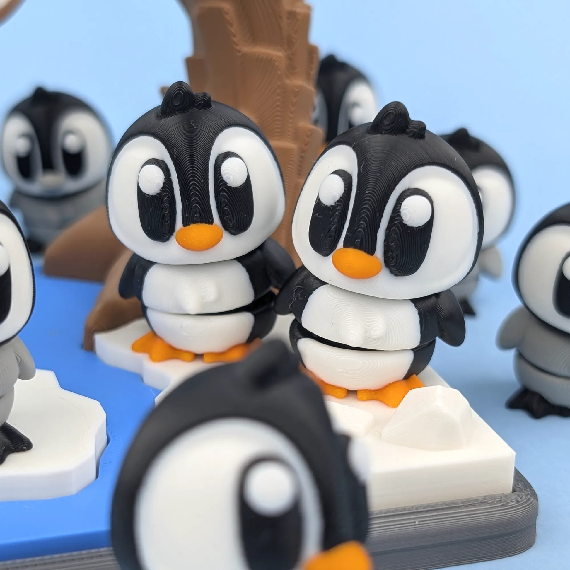 Miniature Flexi Penguin from Tattles Told 3D, part of the Playset, featuring a detailed, flexible penguin figure.