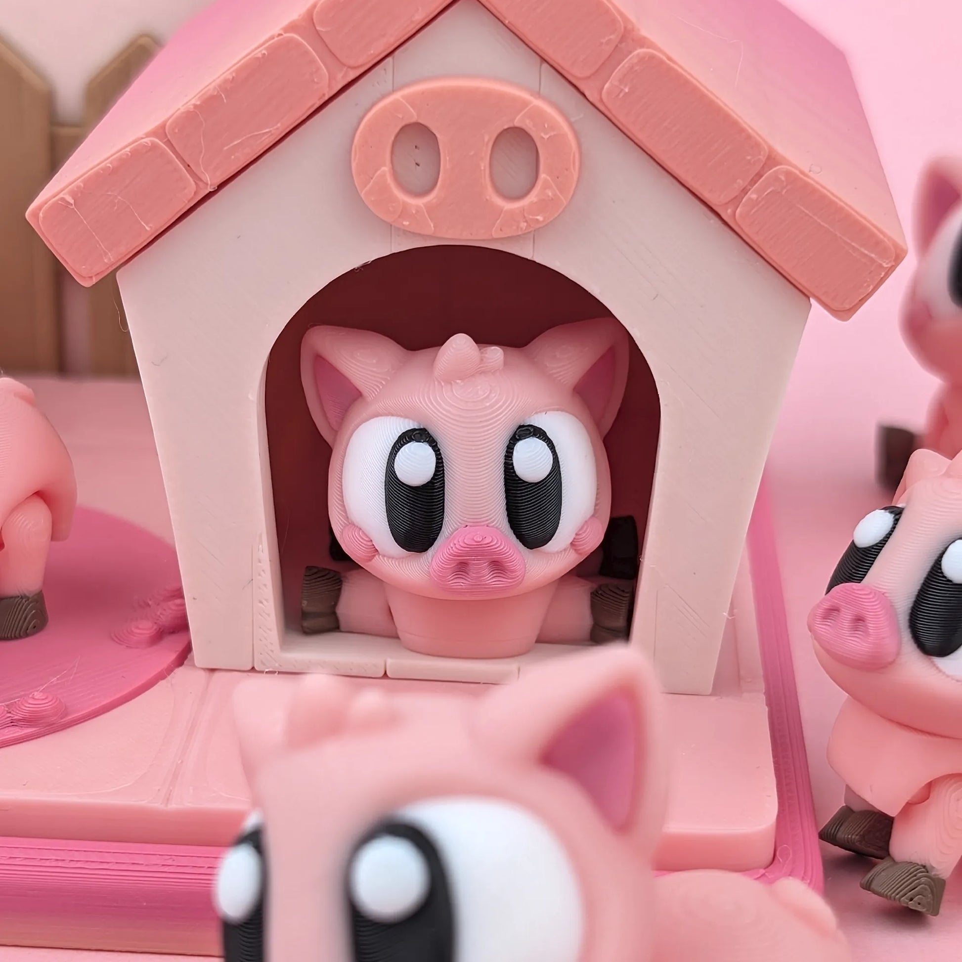 Miniature Flexi Piggy Playset by Tattles Told 3D featuring colorful piggy figures on a playful background.