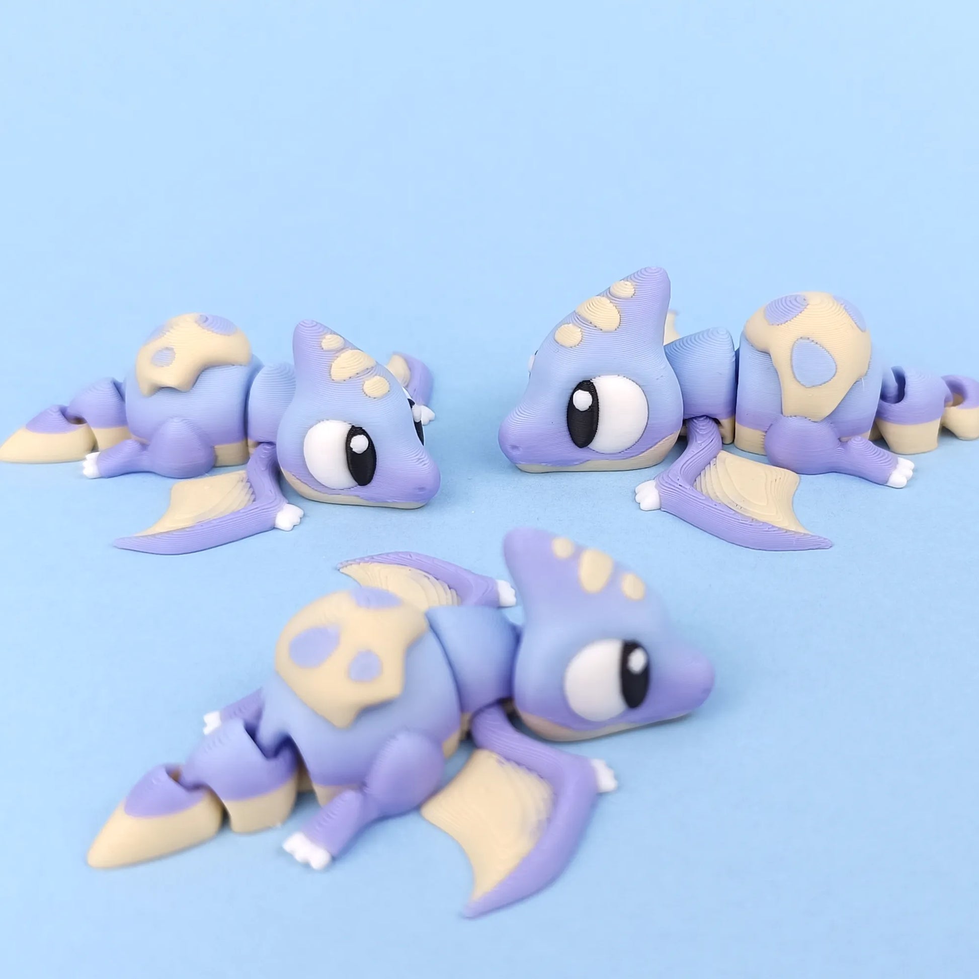 Miniature Flexi Pterodactyl figure by Tattles Told 3D, featuring detailed wings and body in a flexible, poseable design.