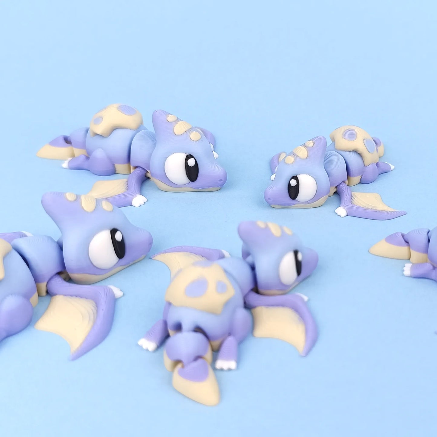 Miniature Flexi Pterodactyl figure by Tattles Told 3D featuring detailed wings and a dynamic pose on a neutral background.