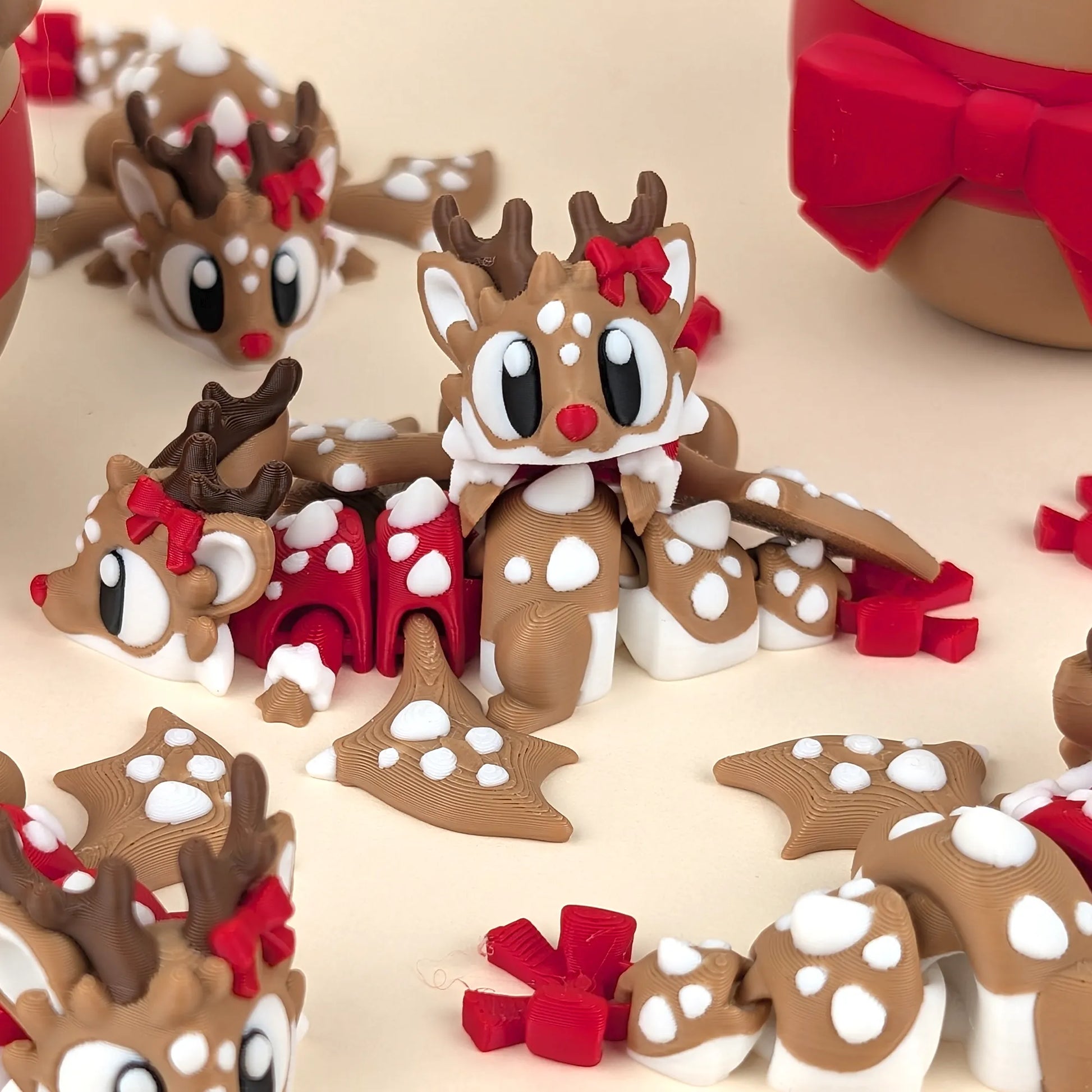Miniature Flexi Reindeer with dragon and egg figurine by Tattles Told 3D, featuring colorful, detailed plastic character on a white background.