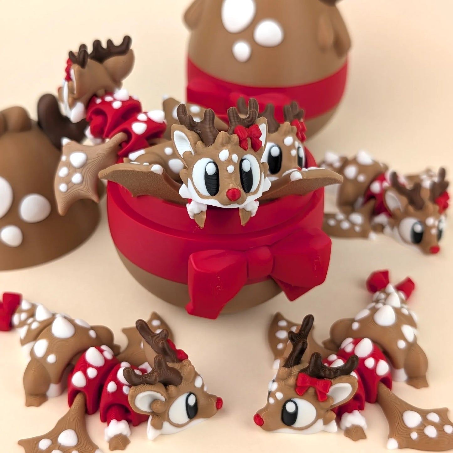Miniature Flexi Reindeer Dragon with Egg by Tattles Told 3D, featuring detailed 3D printed design and vibrant colors.