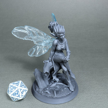 White werewolf fairy miniature from Tattles Told 3D, ideal for D&D tabletop gaming, displayed on a miniature table setting.