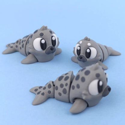 Miniature Flexi Seal by Tattles Told 3D, flexible silicone accessory with detailed design and vibrant colors.