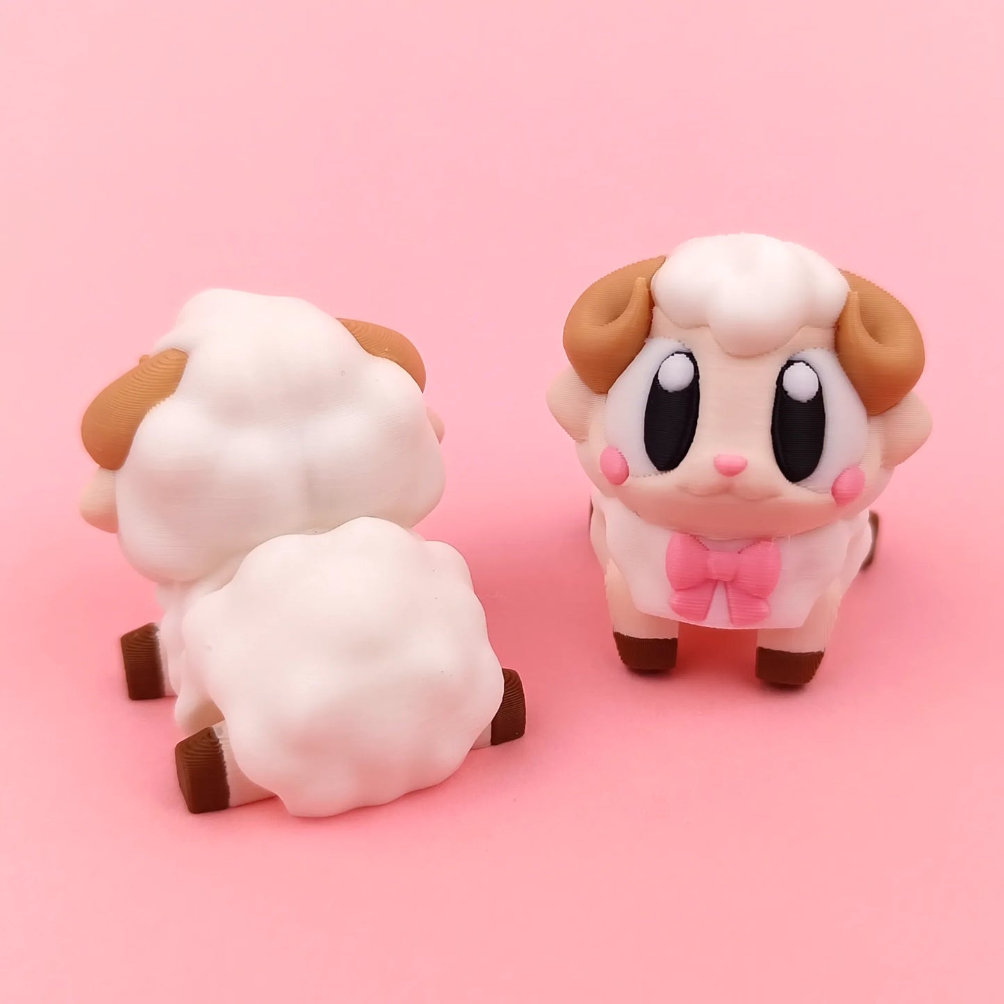Miniature Flexi Sheep figurine by Tattles Told 3D, featuring a flexible design and detailed sheep features.