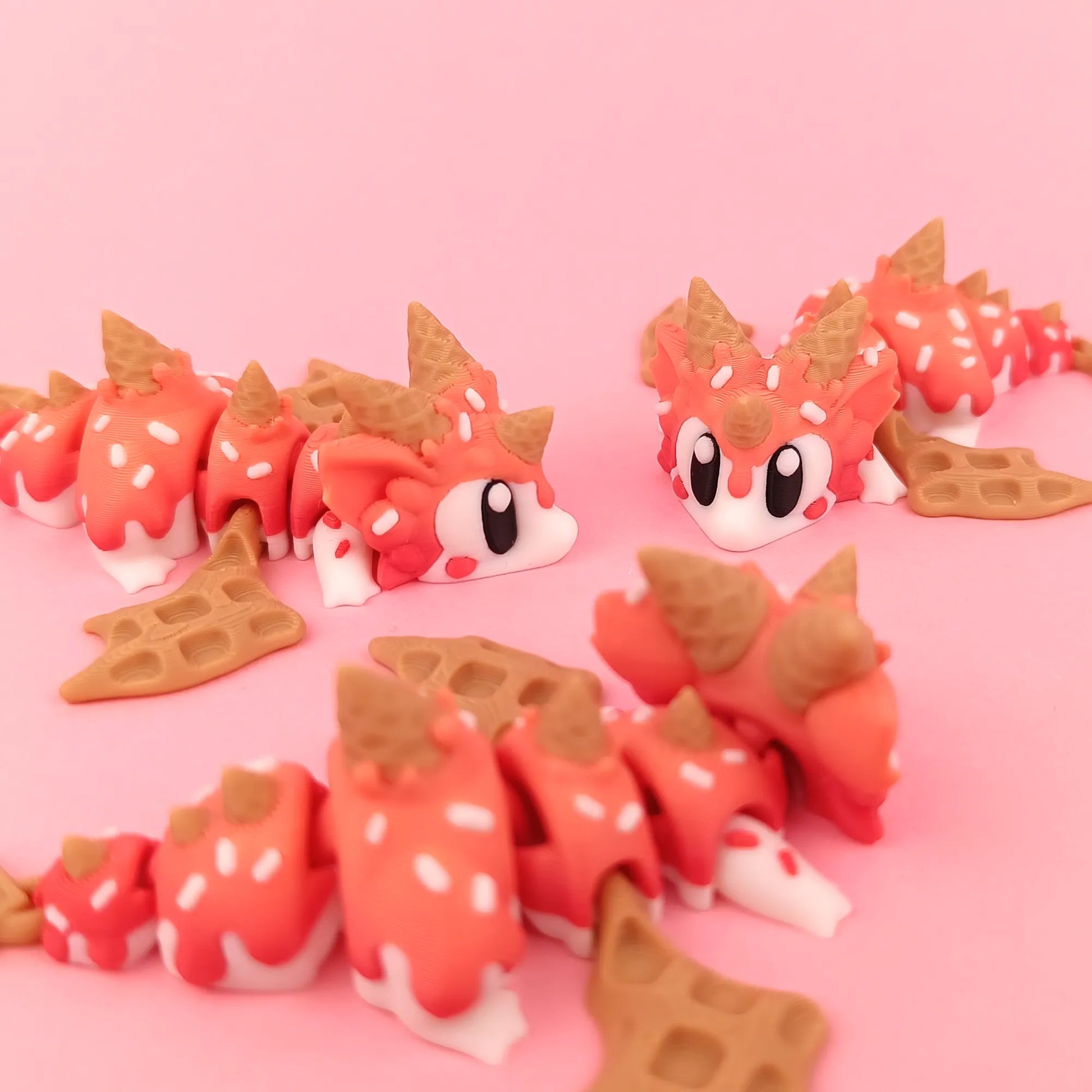 Miniature Flexi Sugar Rush Mini Dragon and Egg by Tattles Told 3D, featuring colorful, detailed dragon and egg figures.