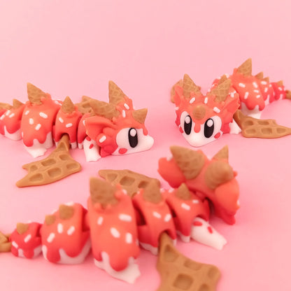 Miniature Flexi Sugar Rush Mini Dragon and Egg by Tattles Told 3D, featuring colorful, detailed dragon and egg figures.