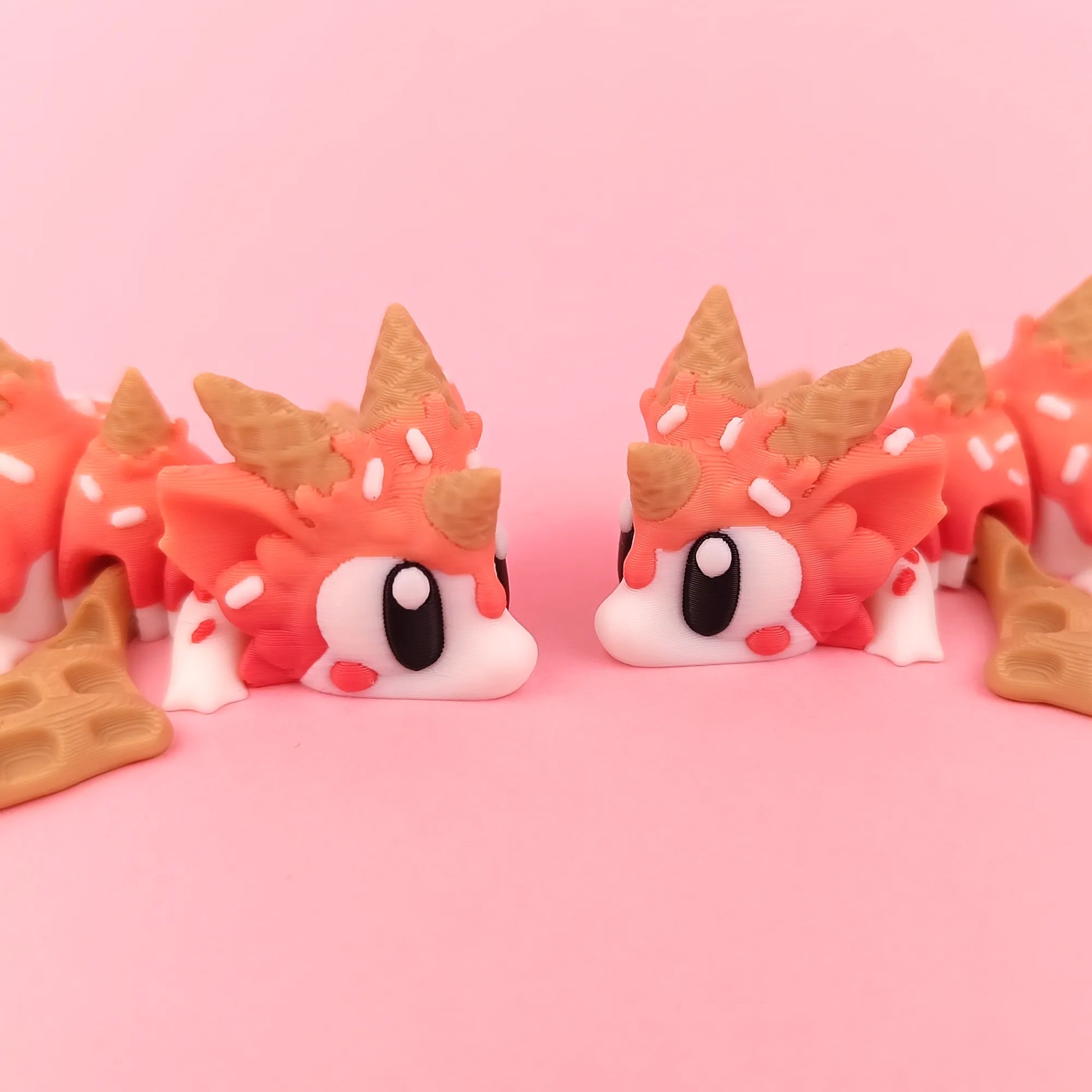 Miniature Flexi Sugar Rush Mini Dragon and Egg by Tattles Told 3D, featuring colorful dragon and egg details in a playful design.